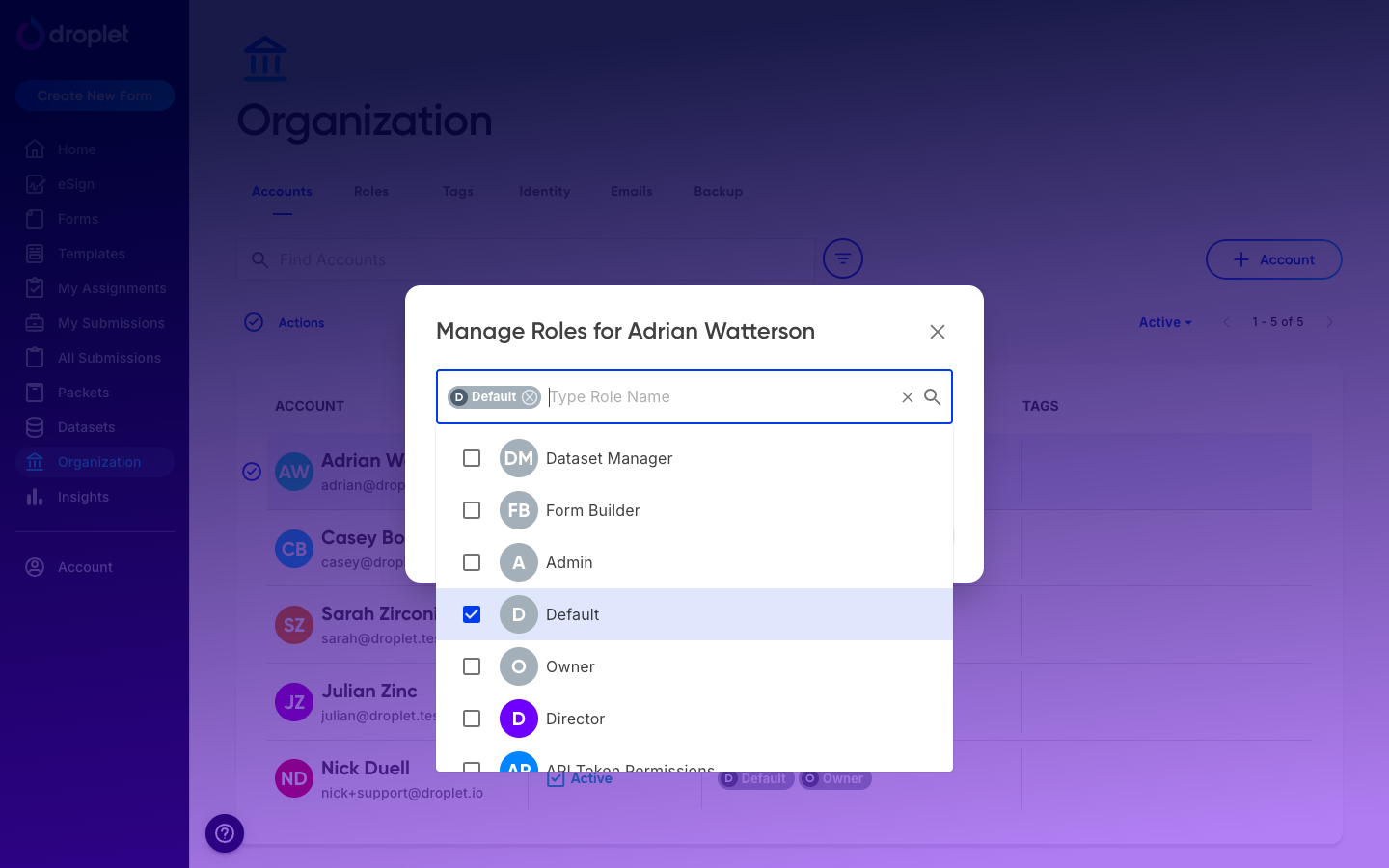 The Manage Roles dialog showing a checkbox list of roles, with Default checked